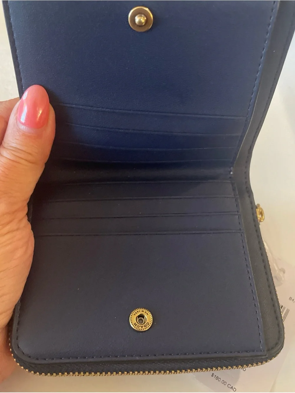 Coach compact zip